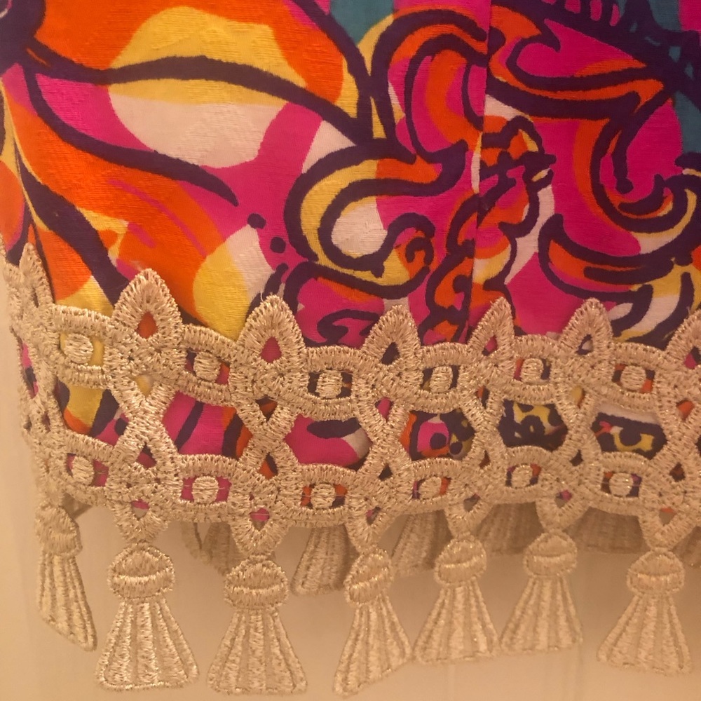 Lilly Pulitzer dress with gold fringe around the hem. - Picture 2 of 2